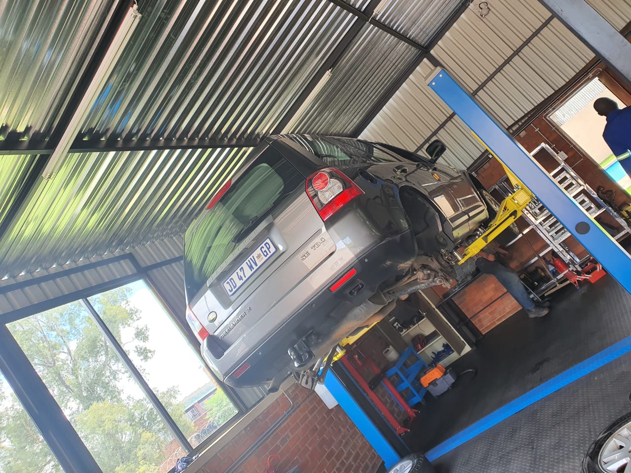 Mobile brake repair technician servicing vehicle in Pretoria